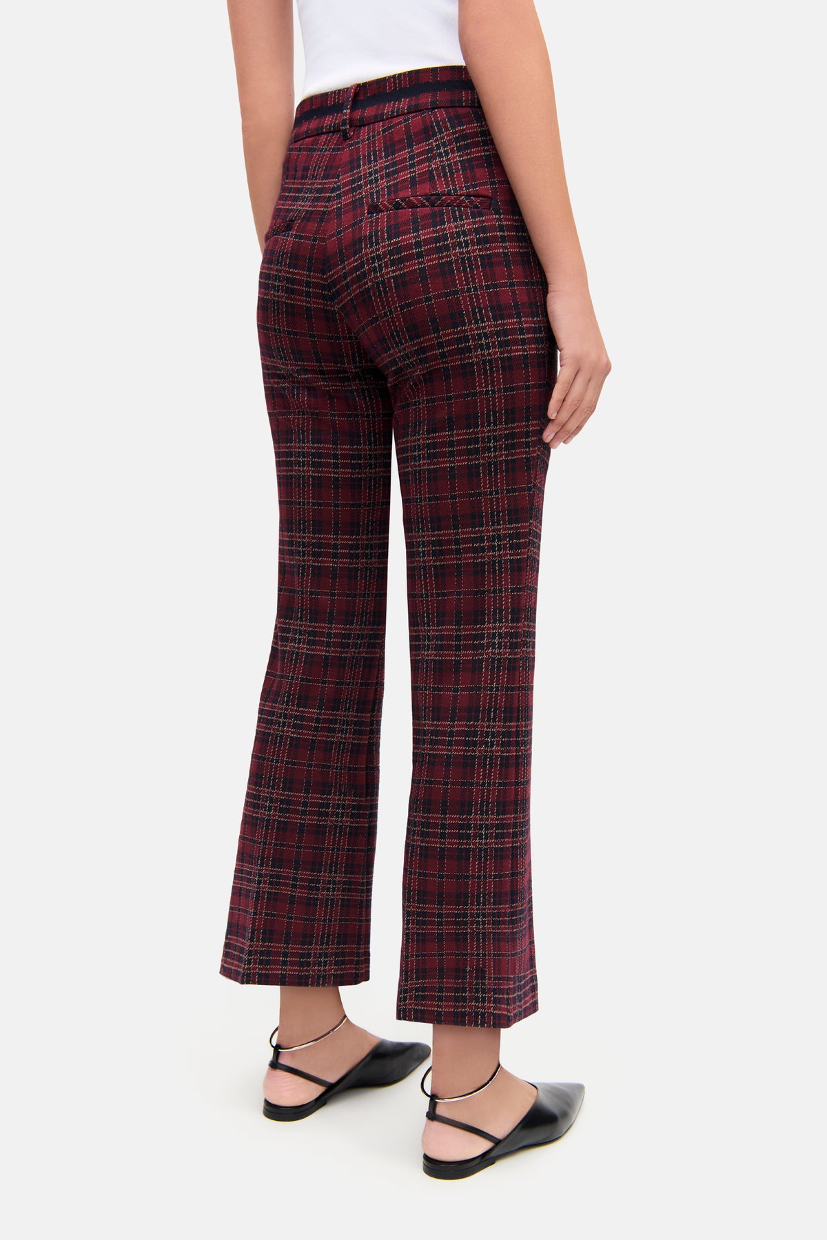 Bordeauxfarbene Flared-Hose aus Tartan-Jersey, Bi-Stretch-Material aus 57% Viskose, 39% Polyamid, 4% Elasthan. Casual Setting.